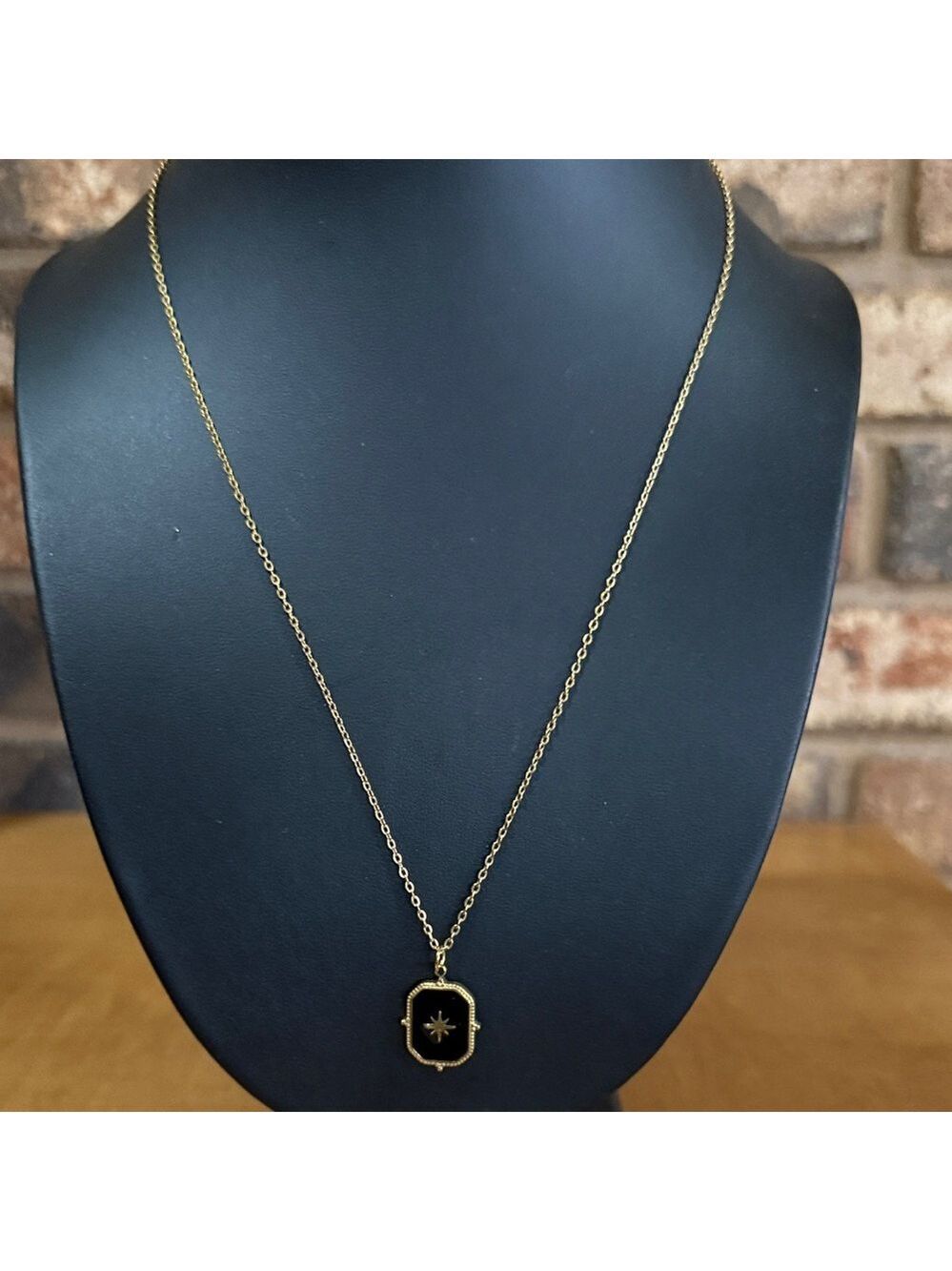 Gold-Tone Black Star Pendant Necklace
